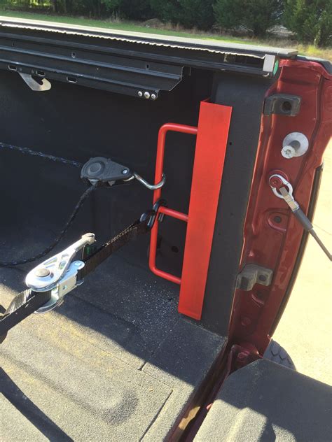 attaching tie down brackets to van metal|L.